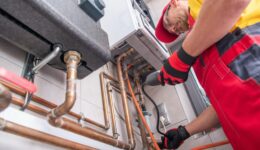 Professional Gas Heating Technician with Gas Detector